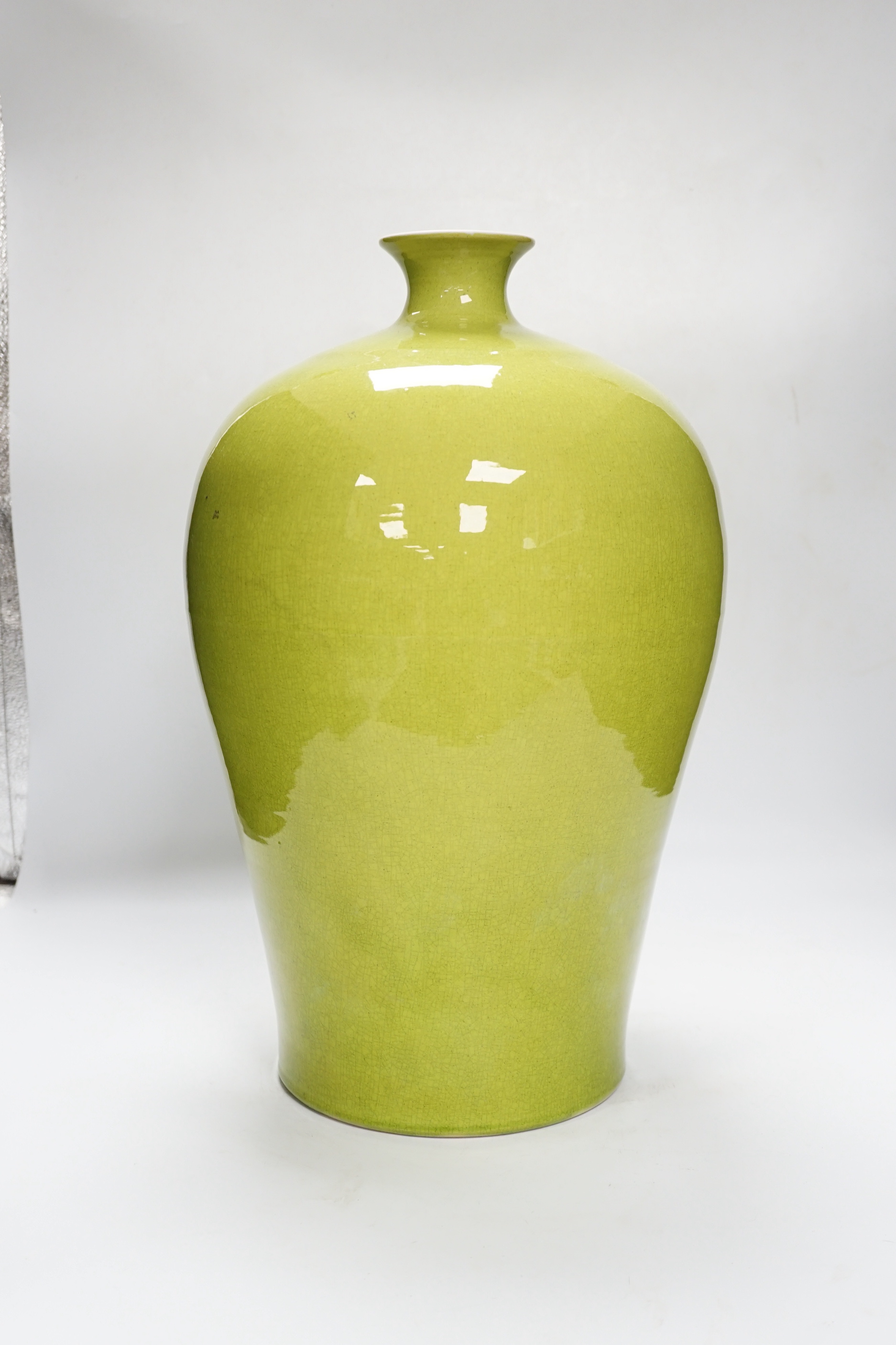 A large Chinese lime-green crackle glazed meiping, 44cm high